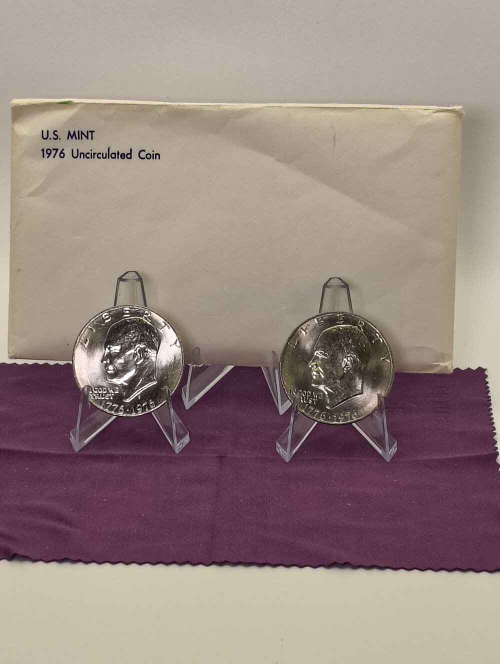 1776-1976 Bicentennial Uncirculated Ike Dollars with Original Mint Envelope.